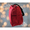 Side view of bag, each side has a large pocket